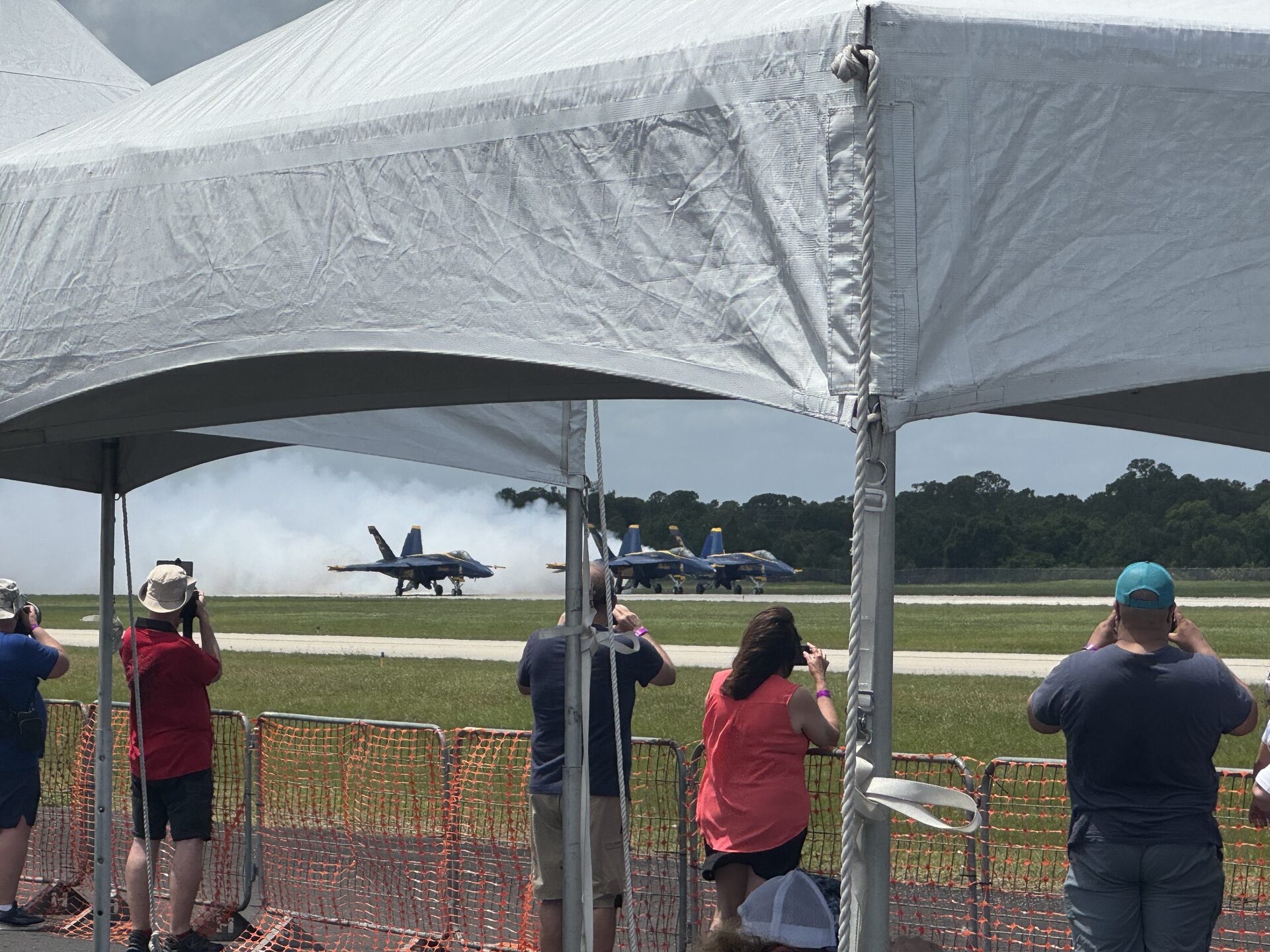 Student at the railing watching the air show