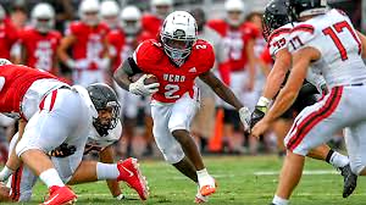 High school football game in action
